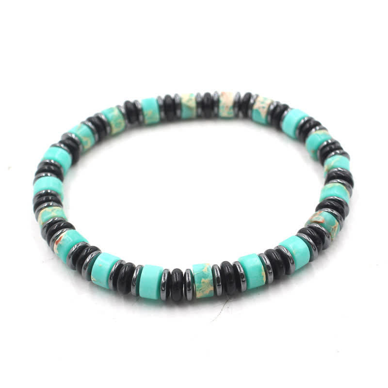 Transformation and Strength Black Obsidian Hematite Ethnic Flat Bead Bracelet