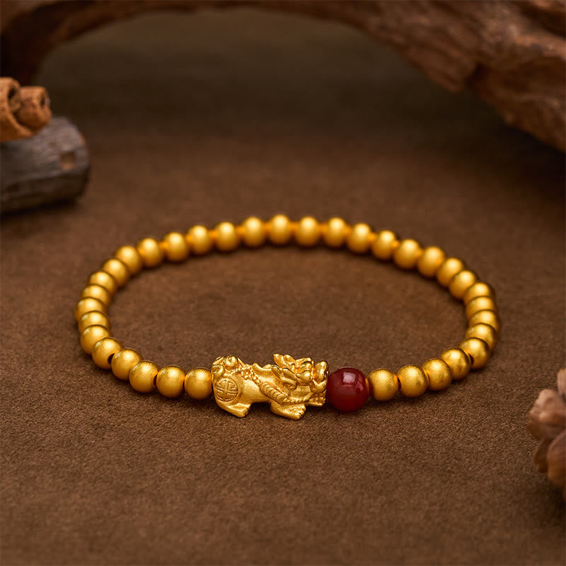 Nimara Ritual Gold Plated Copper Red Agate Pi Xiu Wealth Round Bead Bracelet