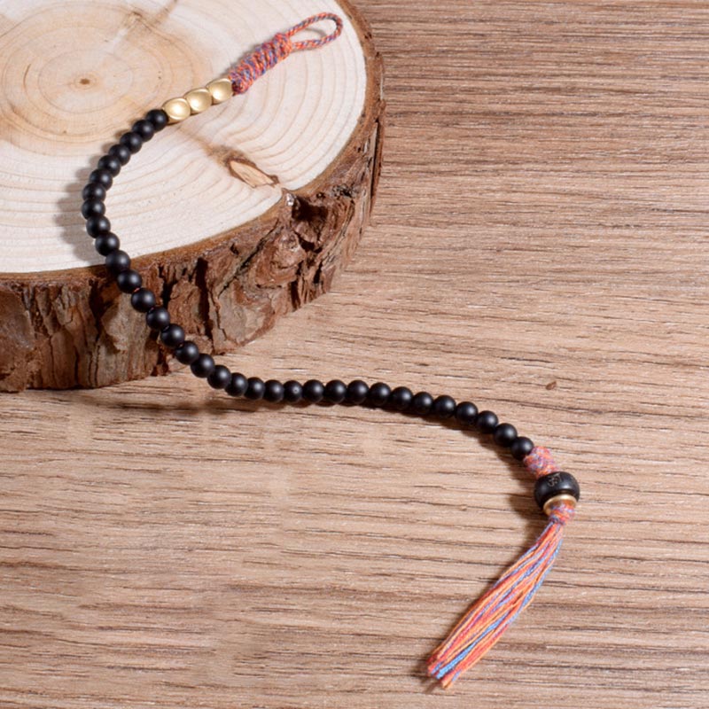 Nimara Ritual Handmade Tibetan Black Onyx Tassel Bracelet