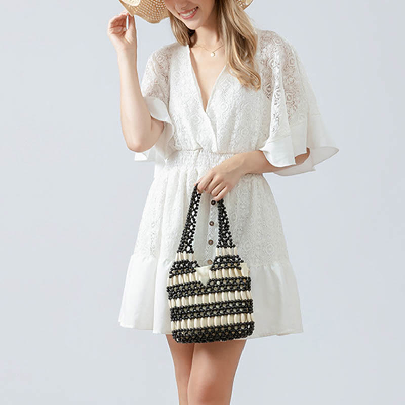 Nimara Ritual Hand-woven Round Wooden Beads Handbag