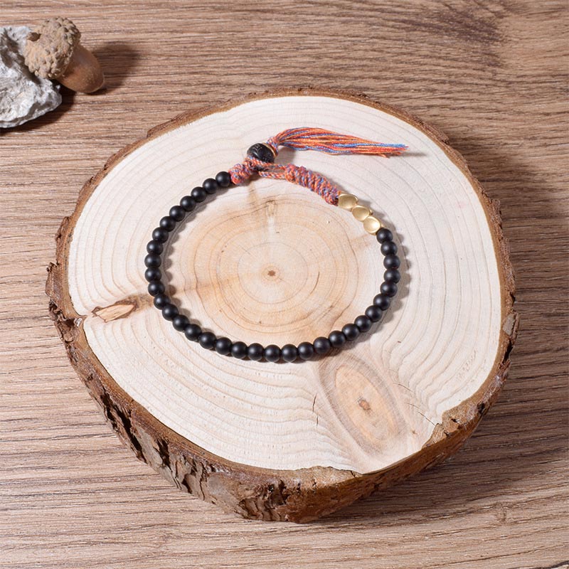 Nimara Ritual Handmade Tibetan Black Onyx Tassel Bracelet