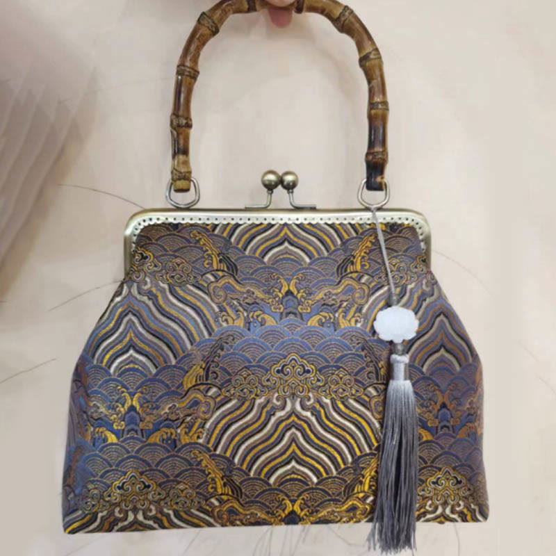 Nimara Ritual Silver Lines Bamboo Handle Metal Chain Crossbody Bag Handbags