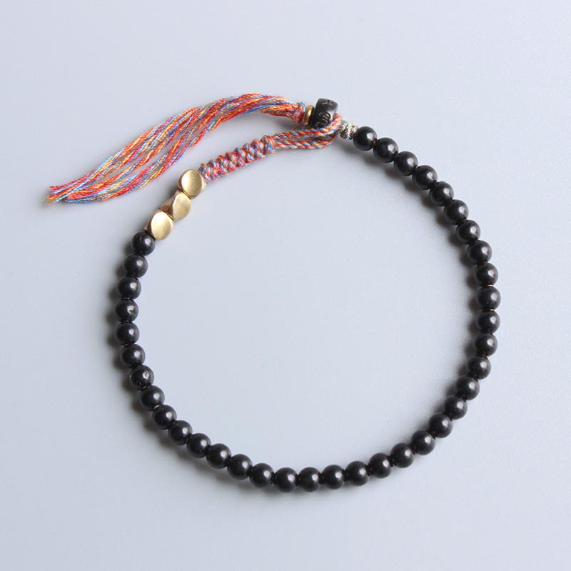 Nimara Ritual Handmade Tibetan Black Onyx Tassel Bracelet