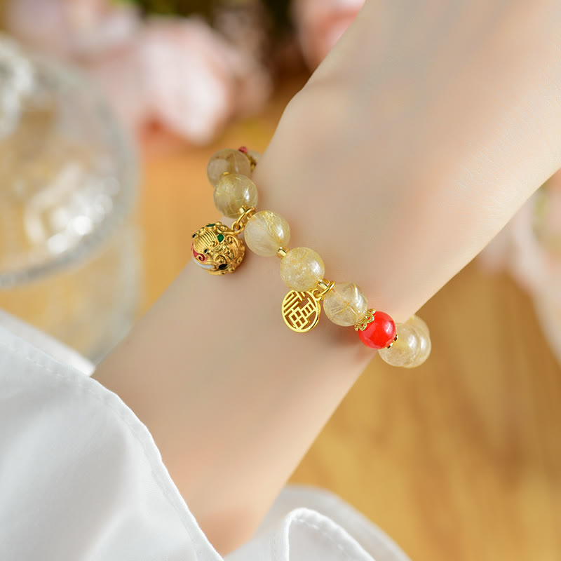 Nimara Ritual Natural Golden Rutilated Quartz Fu Character Charm Bell Wealth Bracelet