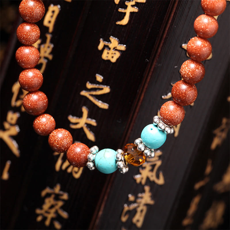 Nimara Ritual 108 Mala Beads Goldstone Om Mani Padme Hum Swastika Confidence Bracelet