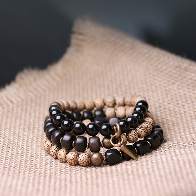 Nimara Ritual Tibetan Bodhi Seed Black Obsidian Ebony Wood Copper Peace Bracelet