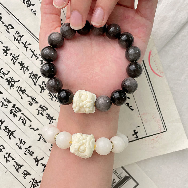 Nimara Ritual Silver Sheen Obsidian Bodhi Seed Ivory Fruit Dancing Lion Protection Bracelet