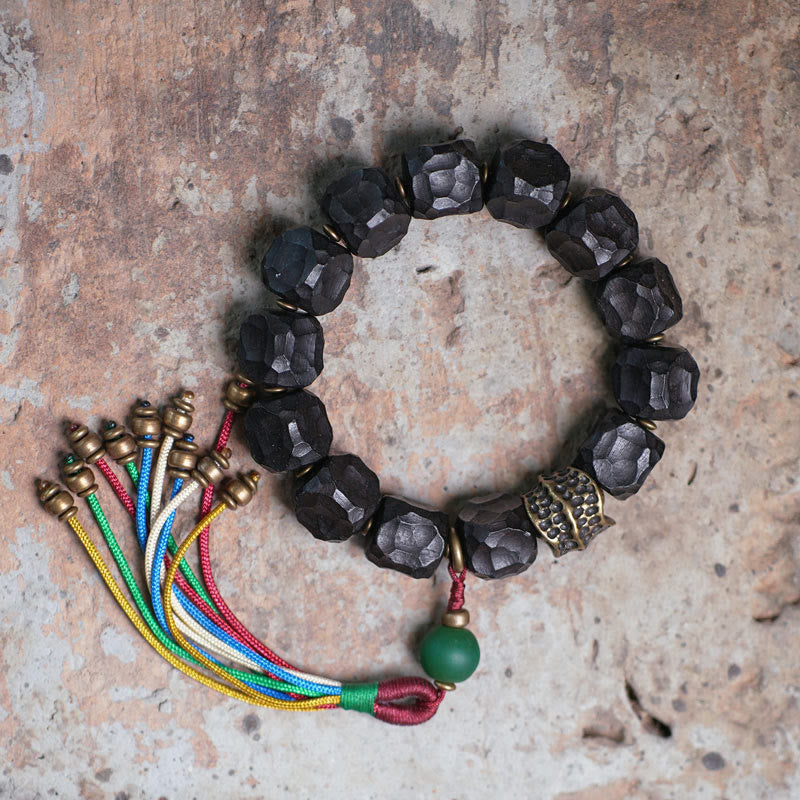 Nimara Ritual Tibet Ebony Wood Copper Peace Tassel Wrist Mala Bracelet