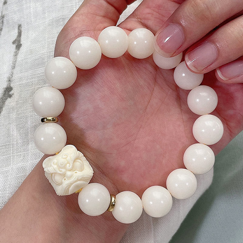 Nimara Ritual Silver Sheen Obsidian Bodhi Seed Ivory Fruit Dancing Lion Protection Bracelet