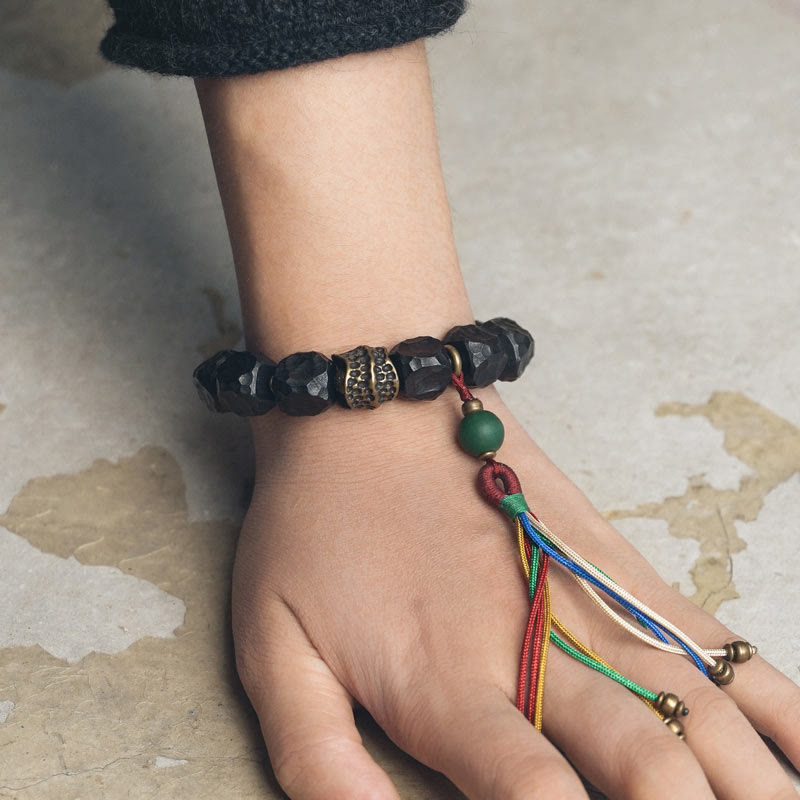 Nimara Ritual Tibet Ebony Wood Copper Peace Tassel Wrist Mala Bracelet