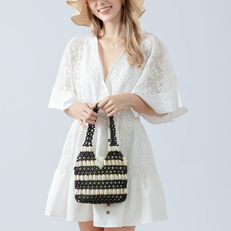 Nimara Ritual Hand-woven Round Wooden Beads Handbag