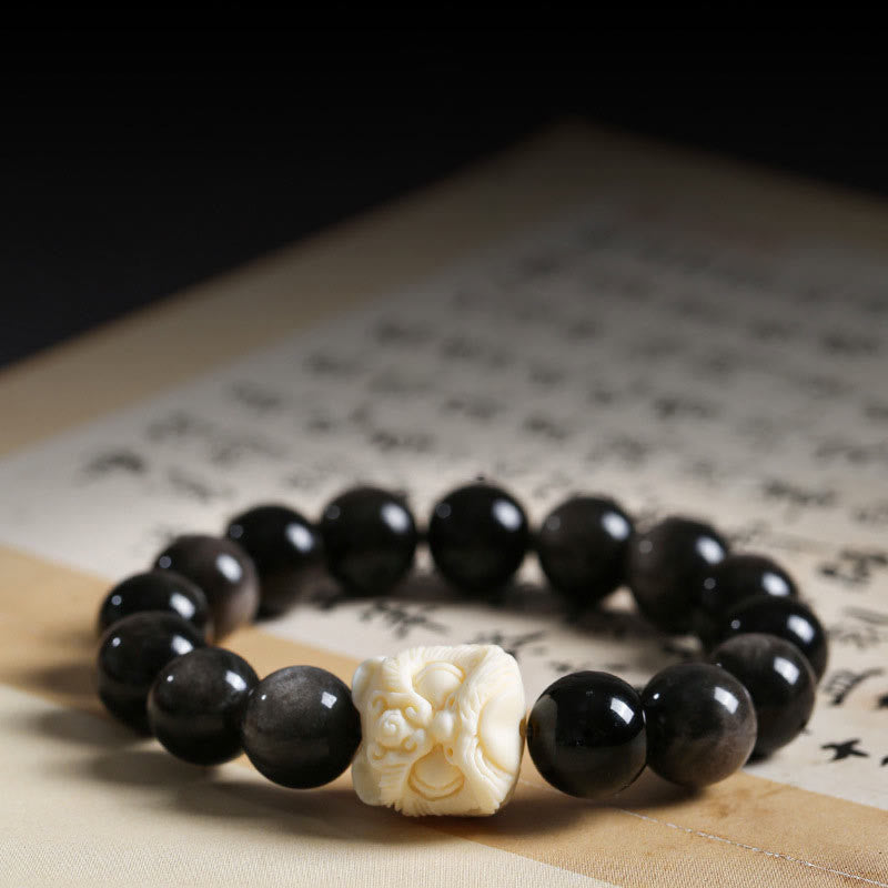 Nimara Ritual Silver Sheen Obsidian Bodhi Seed Ivory Fruit Dancing Lion Protection Bracelet