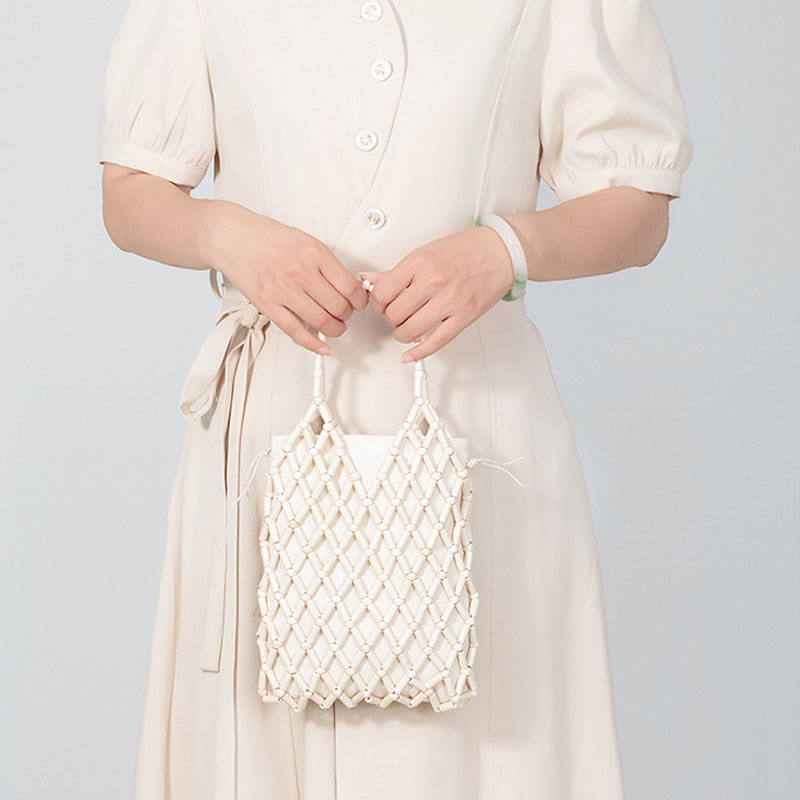 Nimara Ritual Hand-woven Mesh Hollow Wooden Beads Handbag