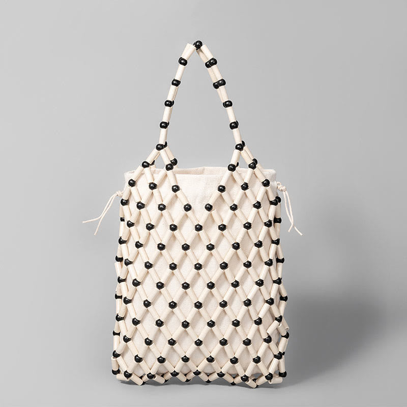 Nimara Ritual Hand-woven Mesh Hollow Wooden Beads Handbag