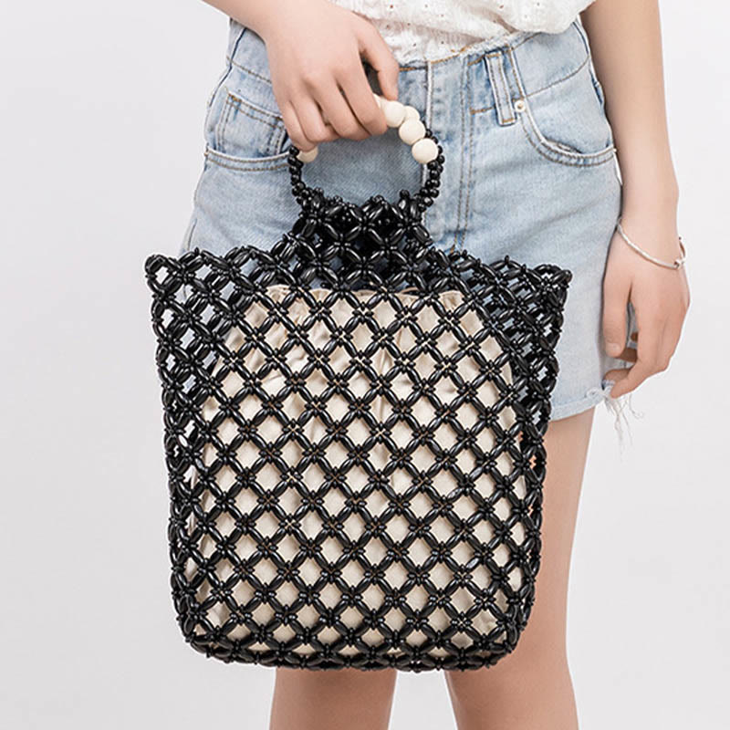 Nimara Ritual Hand-woven Fishing Line Braiding Mesh Hollow Wooden Beads Handbag