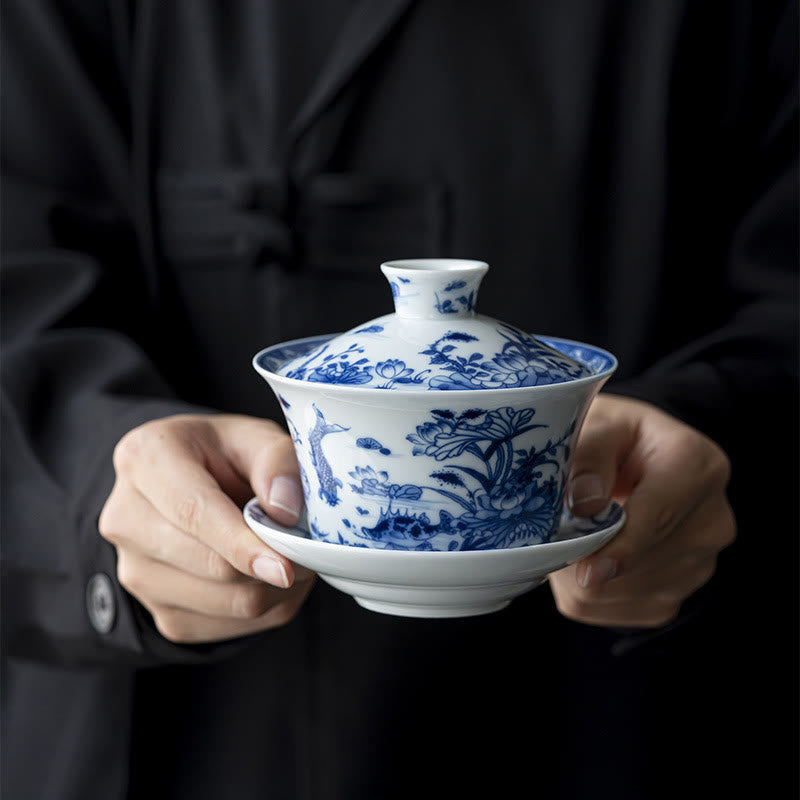 Nimara Ritual Blue And White Porcelain Lotus Koi Fish Lion Dance Watermelon Ceramic Gaiwan Sancai Teacup Kung Fu Tea Cup And Saucer With Lid 300ml