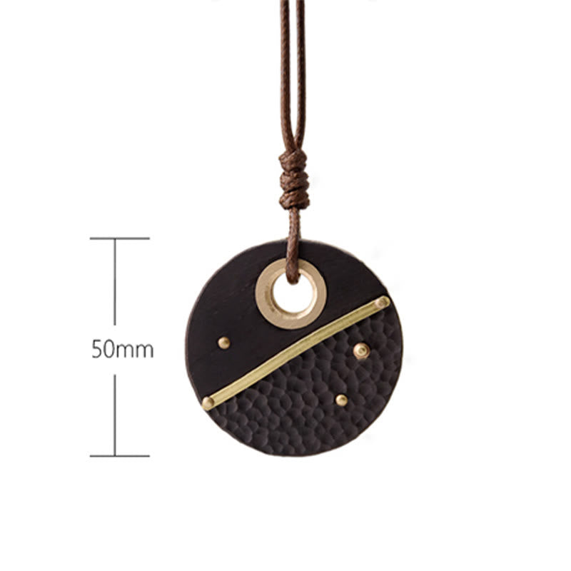 Nimara Ritual Handcrafted Round Ebony Wood Brass Copper Peace Necklace Pendant