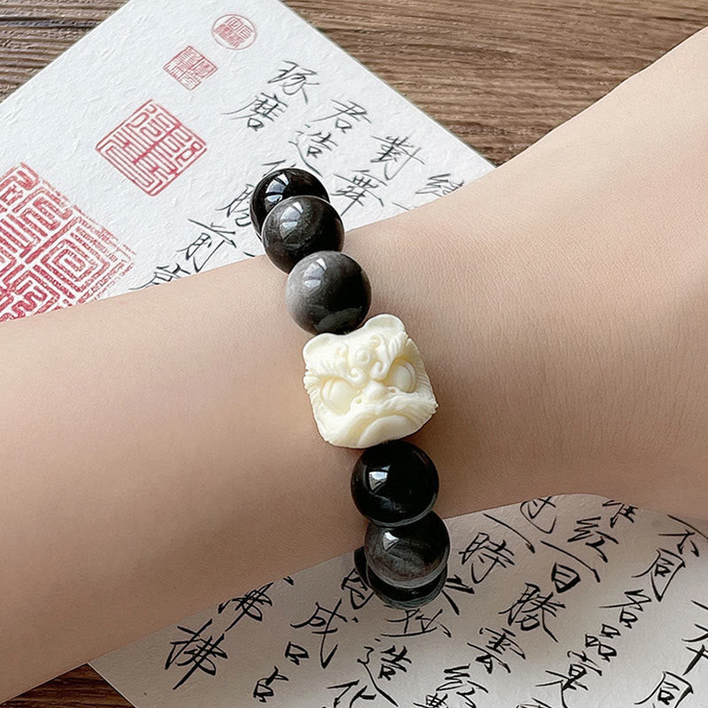 Nimara Ritual Silver Sheen Obsidian Bodhi Seed Ivory Fruit Dancing Lion Protection Bracelet