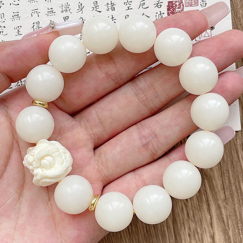Nimara Ritual Silver Sheen Obsidian Bodhi Seed Ivory Fruit Dancing Lion Protection Bracelet