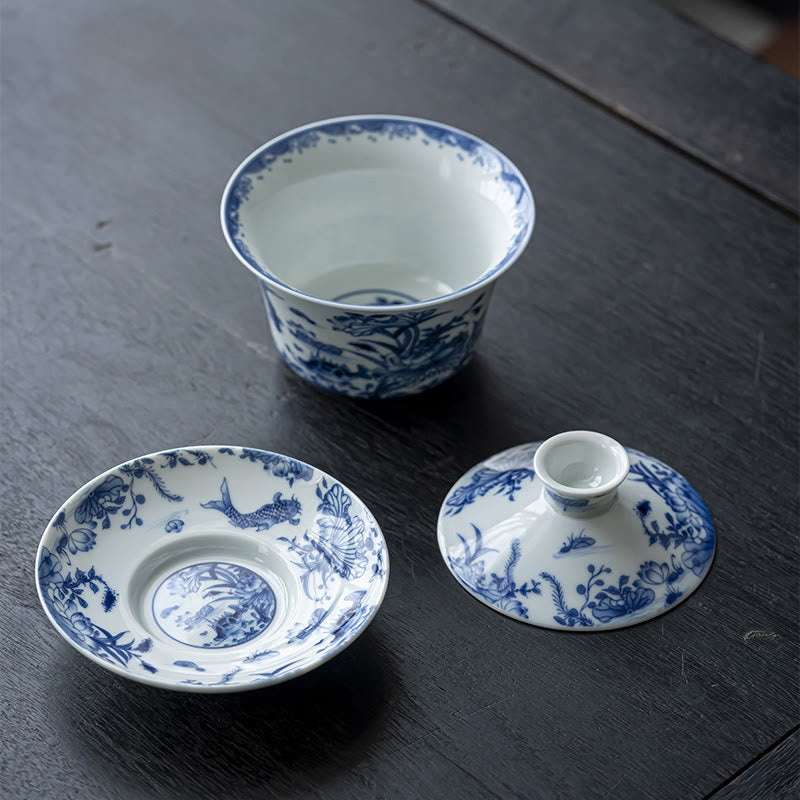 Nimara Ritual Blue And White Porcelain Lotus Koi Fish Lion Dance Watermelon Ceramic Gaiwan Sancai Teacup Kung Fu Tea Cup And Saucer With Lid 300ml